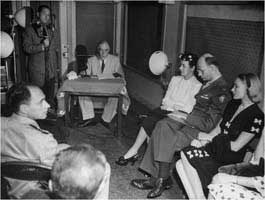fe magazine photo of Roosevelt making his nomination speech via radio on July 20, 1944. The man seated on the left is Navy lieutenant Dr. Howard Bruenn. 