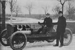 Henry Ford with race car driver Barney Oldfield in 1901. Notice the car still has no steering wheel. 