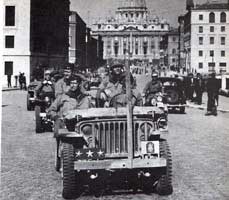 General Clark riding past the Vatican with 2 of his divisional commanders. 