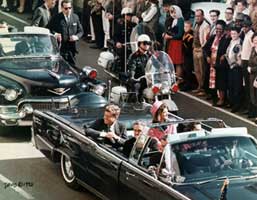 President Kennedy in a motorcade just moments before the assassination. 