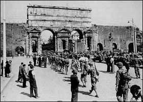 U.S. soldiers marching in Rome during the occupation. 
