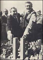 Nelson Rockefeller with NYC Mayor John Lindsay inspecting model of Twin Towers. 