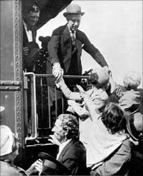 Al Smith campaigning for the Presidency from a train.