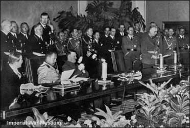 Tripartite Pact signing. Seated on the left starting with Saburo Kurusu, Galeazzo Ciano and Adolf Hitler. 