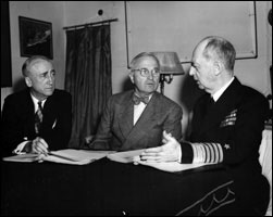 Admiral Leahy and Secretary of State Jimmy Byrnes with President Truman aboard the Augusta on their way to Potsdam, Germany.
