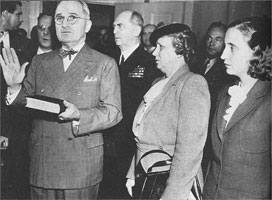 President Truman took the oath of office on the Douay-Rheims Version. In the background can be seen the sinister admiral Leahy. 